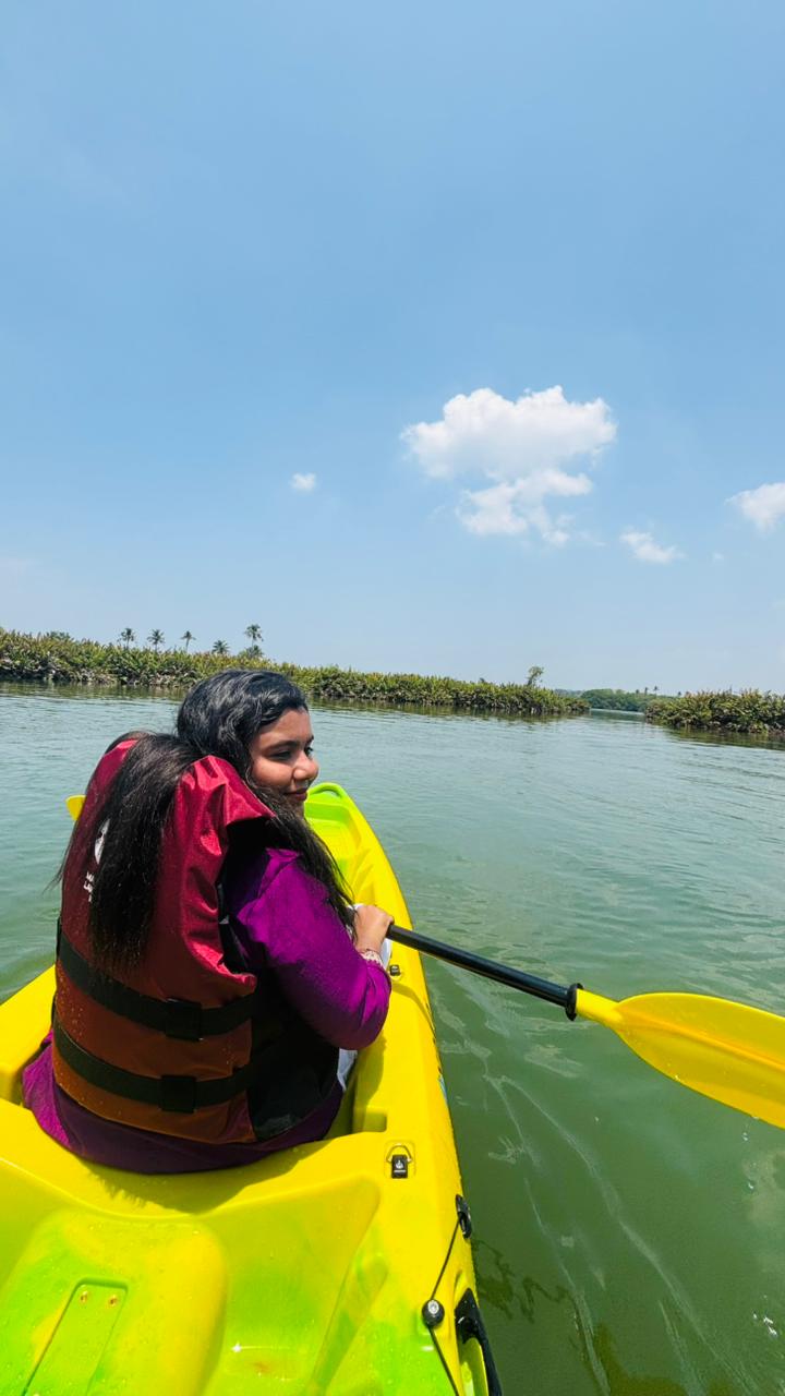 Kayaker under a bright blue sky